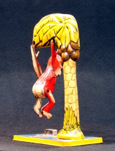 Bombo, tin toy monkey in tree, pic 5