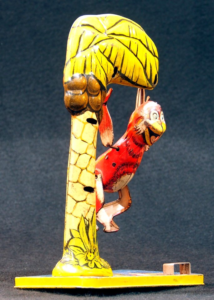 Bombo, tin toy monkey in tree, pic 3