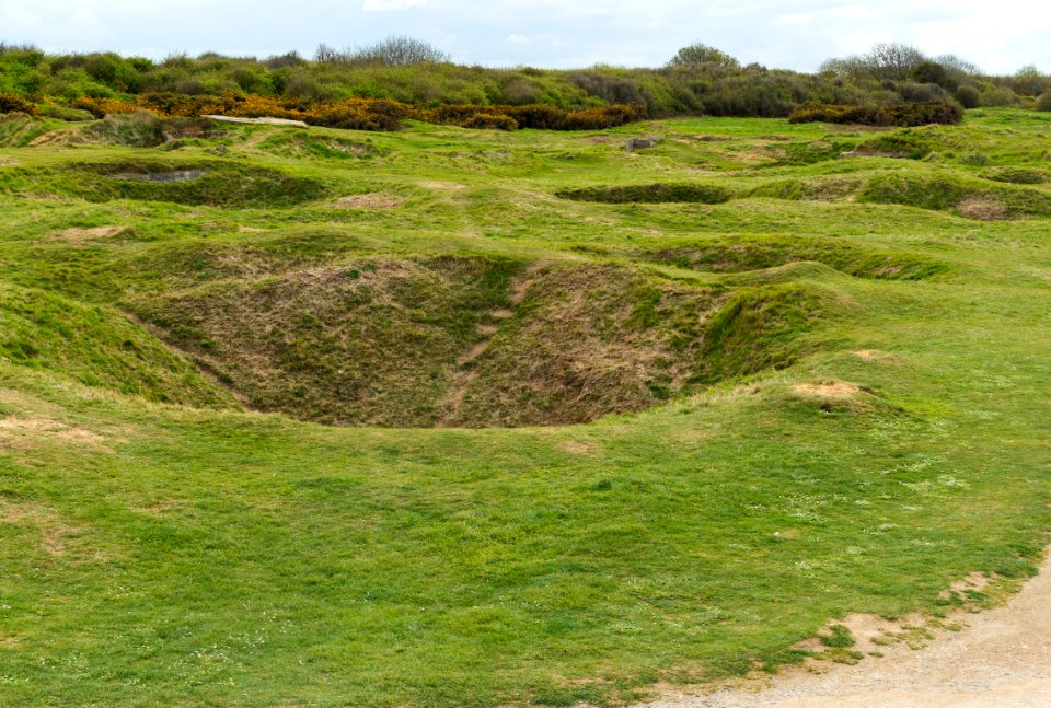 Bombing craters at Pointe du Hoc