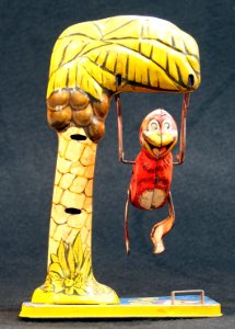 Bombo, tin toy monkey in tree, pic 2