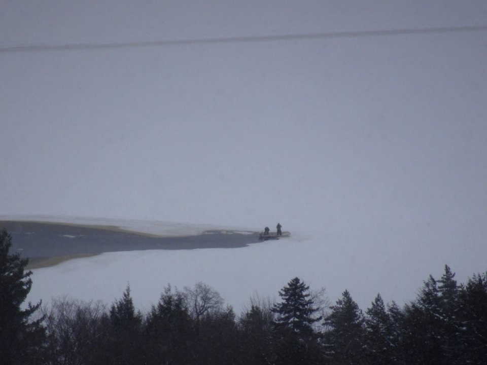 Boat in frozen lake opening 2