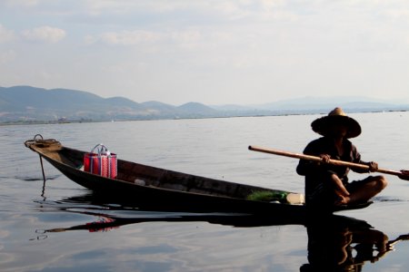 Boatman at Inle Lake photo