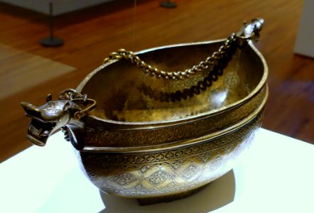 Boat or alms vessel (kashkul) with dragon-headed extremities, Iran, 1575-1600 AD, engraved brass, view 2 - Aga Khan Museum - Toronto, Canada - DSC06849