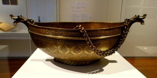Boat or alms vessel (kashkul) with dragon-headed extremities, Iran, 1575-1600 AD, engraved brass, view 1 - Aga Khan Museum - Toronto, Canada - DSC06845