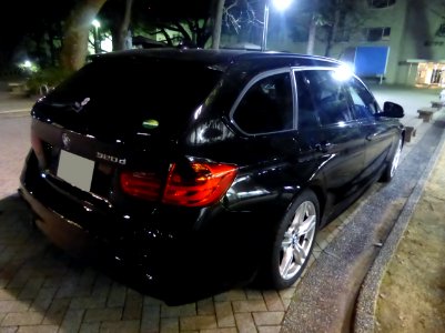BMW 320d Touring (F31) at night rear