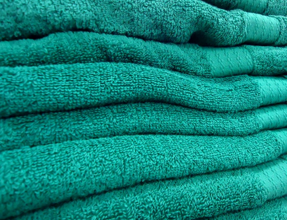 Bluegreen towels in a store