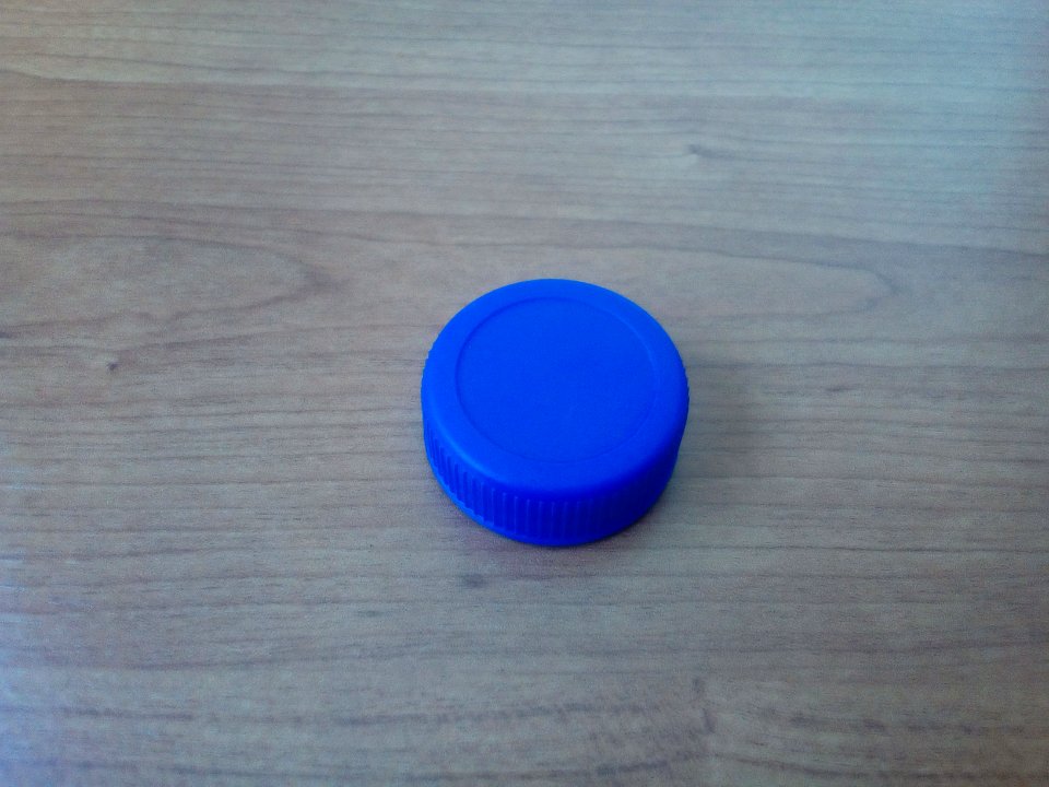 Blue plastic bottle lid