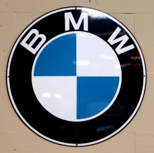 BMW, Enamel advert sign at the den hartog ford museum pic-021