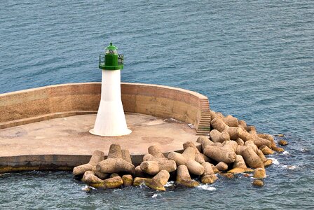 Lighthouse white green sea