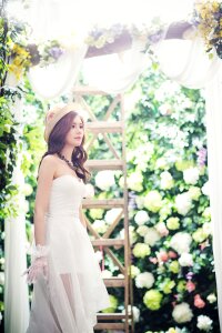 White dress bride garden