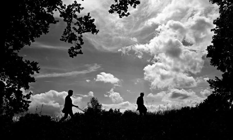 Clouds trees embankment photo