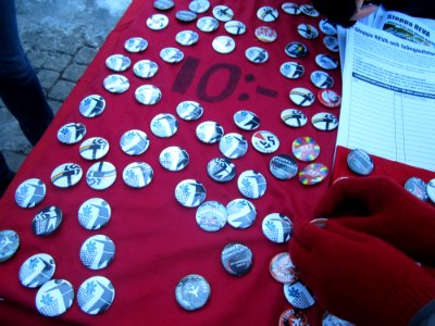 Book table by Rättvisepartiet Socialisterna at demonstration against Swedish migration policy in Stockholm