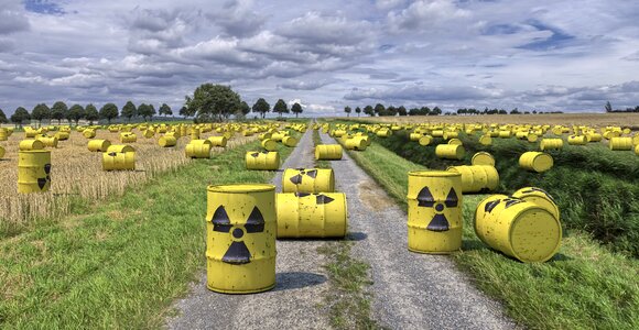 Nuclear waste casks barrels composing photo