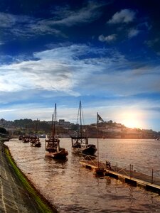 Portugal boats clouds photo