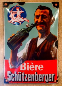 Bière Schützenberger , enamel advertising sign at the Musée Européen de la Bière
