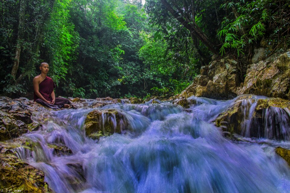 Monk meditating monk at creek buddhist