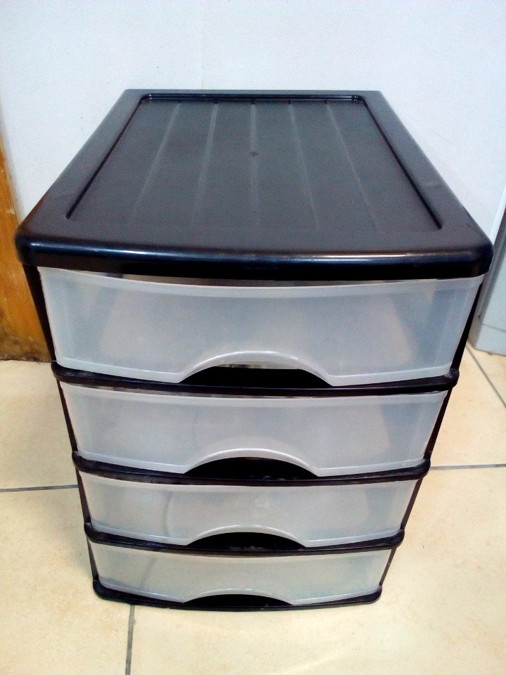 Black plastic chest of drawers for desktop