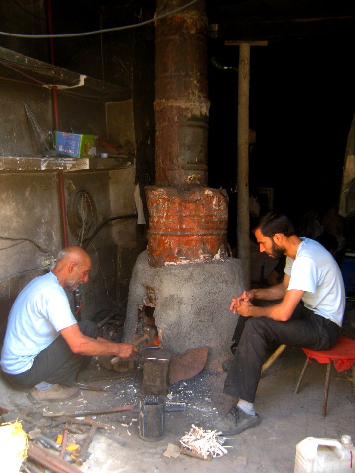 Blacksmith and his son in the Bazaar of Nishapur 4