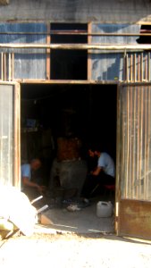 Blacksmith and his son in the Bazaar of Nishapur 6