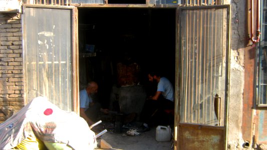 Blacksmith and his son in the Bazaar of Nishapur 2