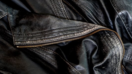 Black worn leather jacket detail 3