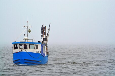 Sea boat fisherman photo