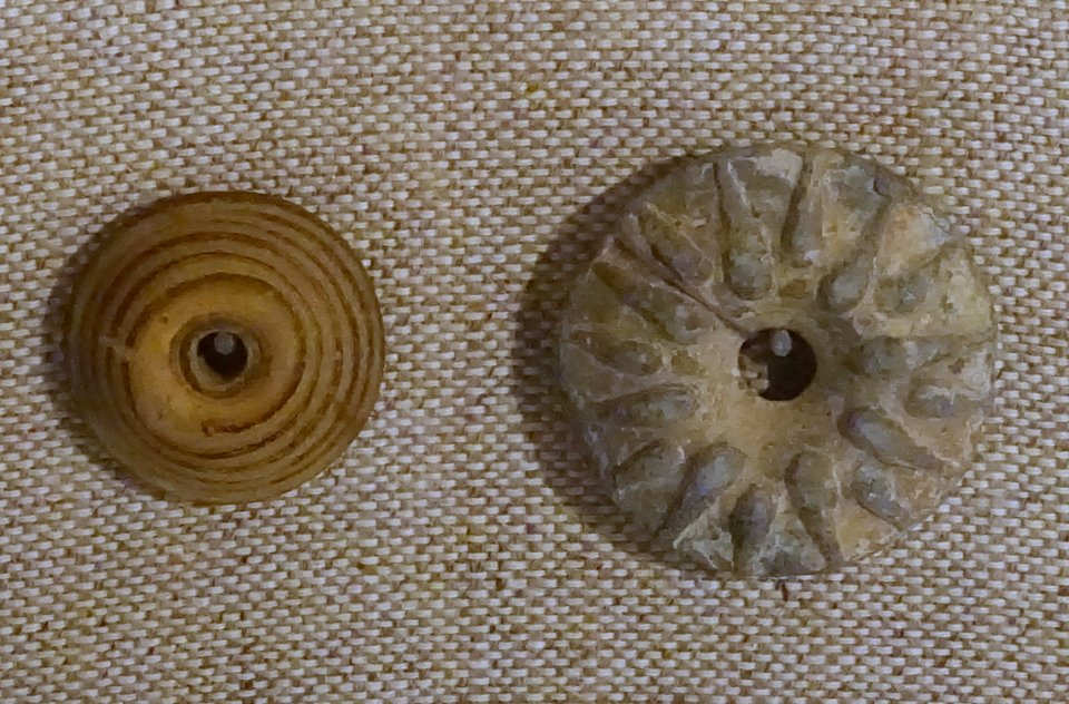 Buttons, Roman, left Italy, glass, right probably Italy, lead, both 1st-6th century AD - Spurlock Museum, UIUC - DSC05863