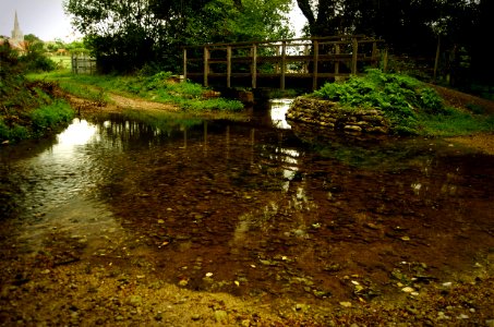 Bythams Brook with footbridge in Little Bytham