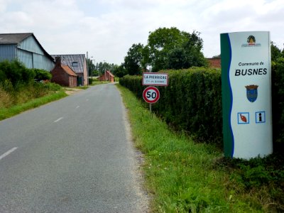 Busnes (Pas-de-Calais) city limit sign La Perrière