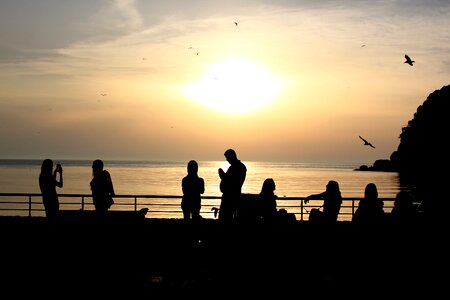 Coastline reverse light people photo