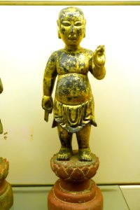 Boy Buddha statue, Restored Le dynasty, 17th-18th century, crimson and gilded wood - National Museum of Vietnamese History - Hanoi, Vietnam - DSC05665