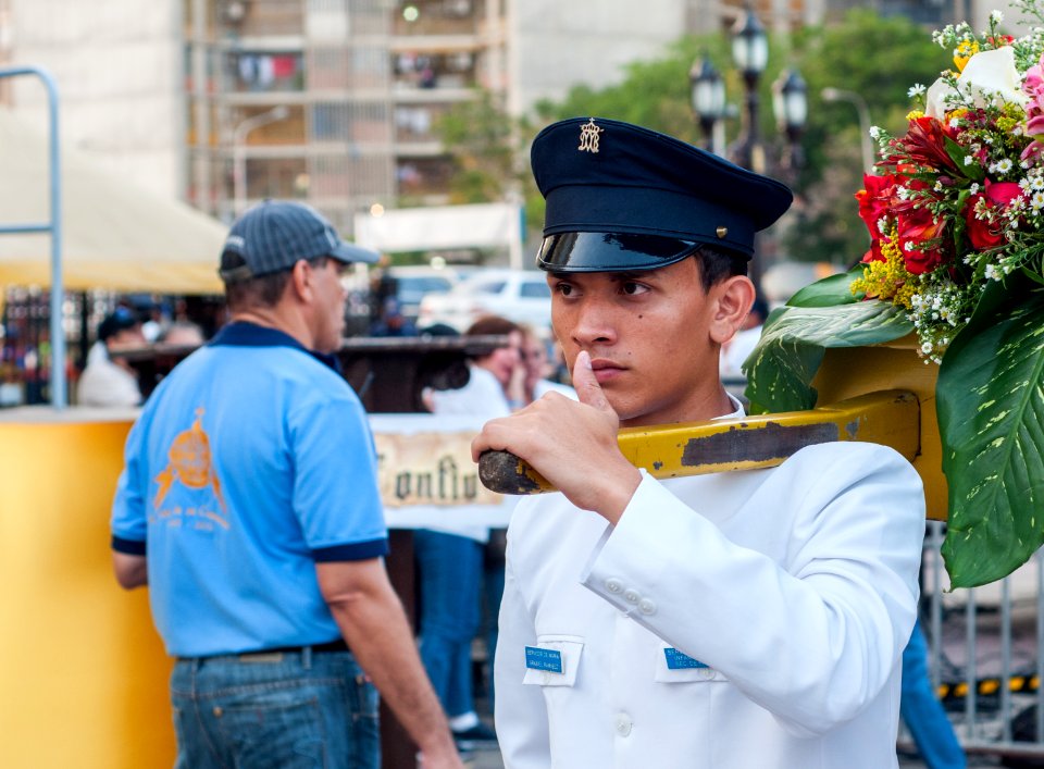 Boy carring La Chinita in Jesus Misericorde