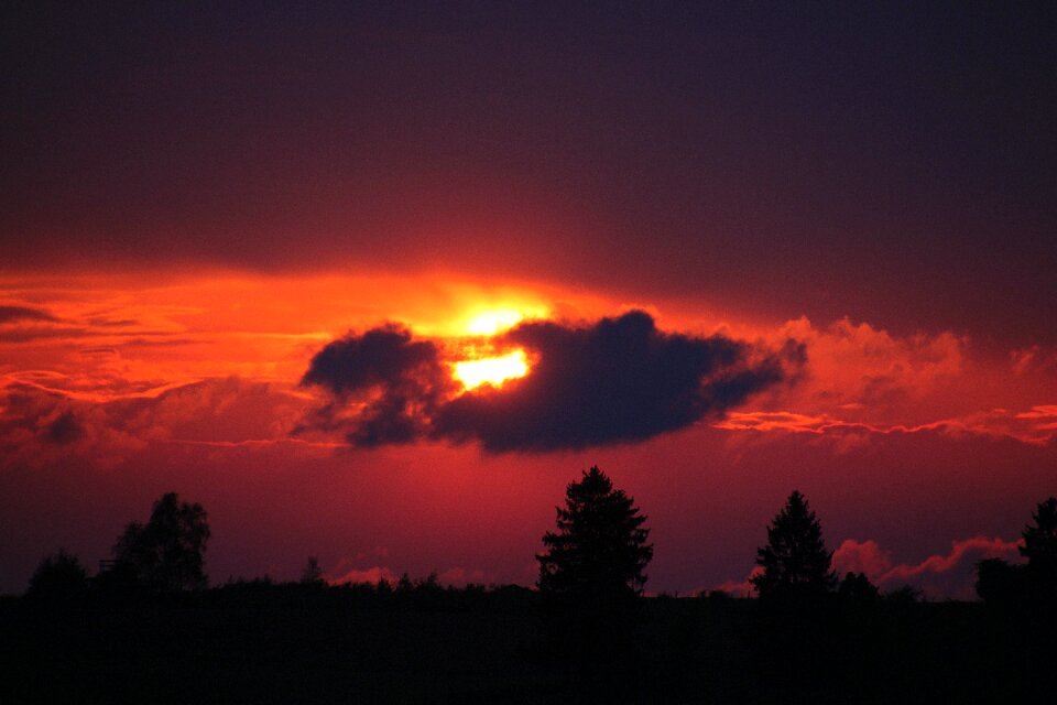 Setting sun afterglow clouds photo