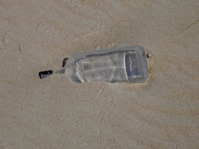 Bottle in the sand