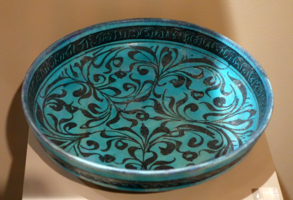 Bowl with calligraphy, waterweeds, and inscription repeating the word 'Glory', Iran, Kashan, probably 13th century AD, composite body, painted under turquoise glaze - Huntington Museum of Art - DSC05009