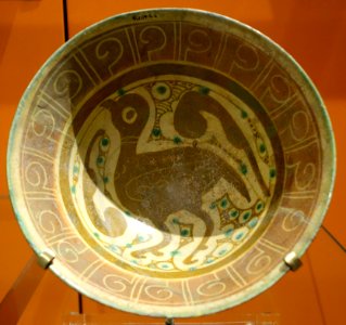 Bowl with a bird and comma-shaped leaves, Iran, Nishapur, 10th-11th century, slip-painted earthenware - Royal Ontario Museum - DSC04649