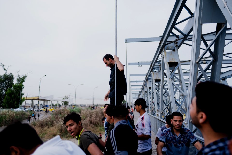 Boys playing and diving at the Old Bridge over the Tigris in Mosul in 2019 during the summertime 07