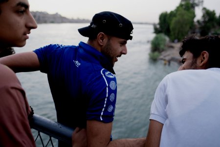 Boys playing and diving at the Old Bridge over the Tigris in Mosul in 2019 during the summertime 06