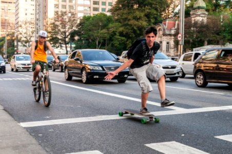 Boys playing in Avenida Paulista photo