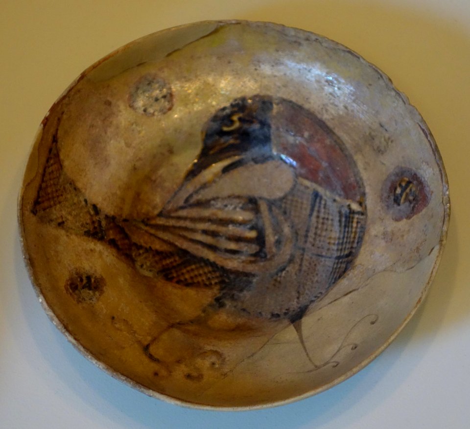 Bowl with design of bird, probably eastern Mediterranean, 8th or 9th century AD, earthenware with black & brown paint over transparent yellow glaze - Cincinnati Art Museum - DSC04160