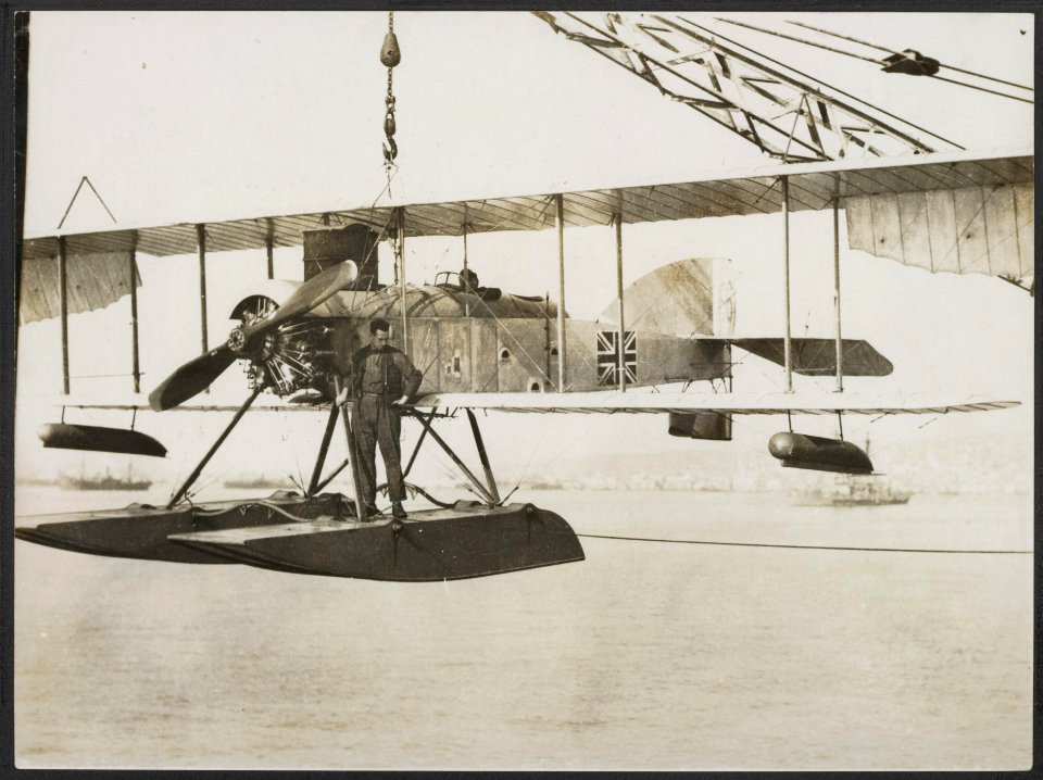 British seaplane being lowered to the water from the parent ship., Bestanddeelnr 158-1989
