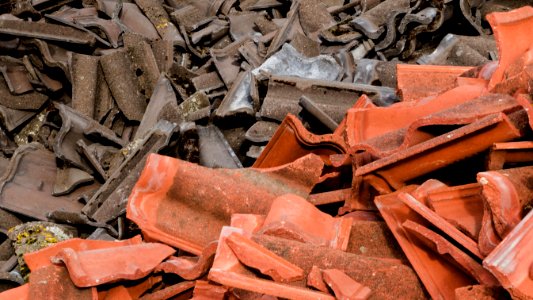 Broken red and black roof tiles 2