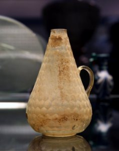 British Museum Roman Empire 1802201 Blown glass jug with facet-cut decoration Ancient Roman colourless glass 5933 photo