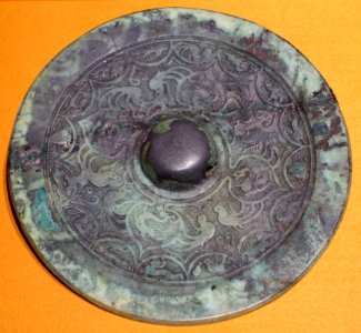 Bronze mirror with dragon and phoenix motifs, Western Jin dynasty, from M3, Huangpu Jitang, Guangzhou - Hong Kong Museum of History - DSC00854