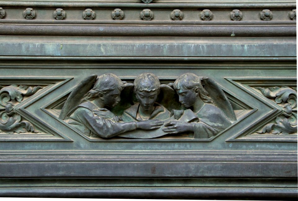 Bronze singing angels gate Cathedral Florence