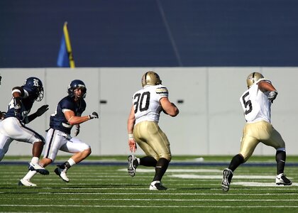 Runner ball carrier defense photo