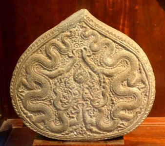 Bright pointed circule engraved with dragon, Phat Tich pagoda, Bac Ninh, 1057 AD, stone - Vietnam National Museum of Fine Arts - Hanoi, Vietnam - DSC04766