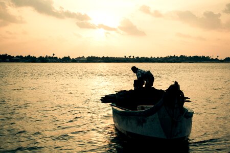 Sunset fishing hard-working