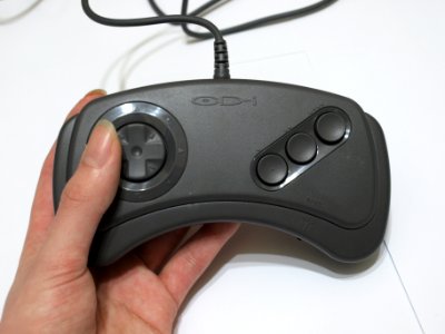 CD-i gamepad with hand photo