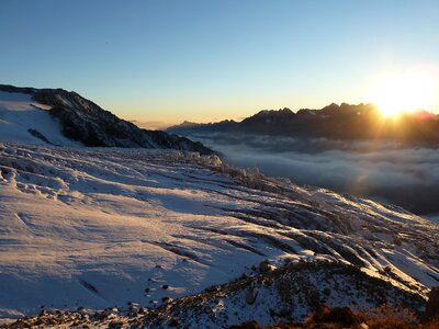 Lying sun sky snow photo